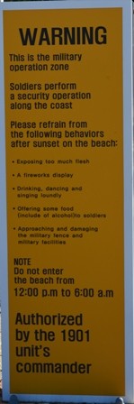 Gangneung Jumunjin Beach military warning sign